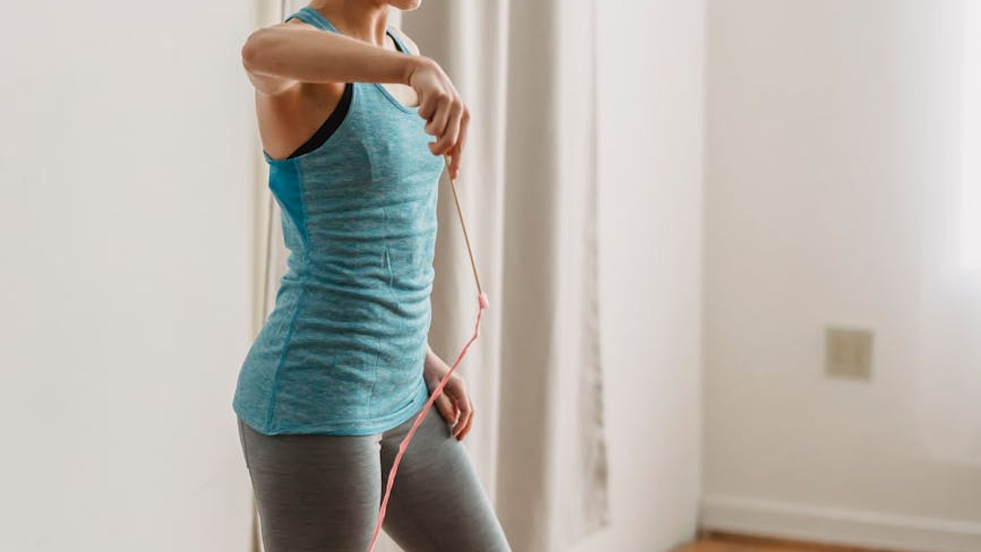 Active person moving in a rhythmic way outdoors.