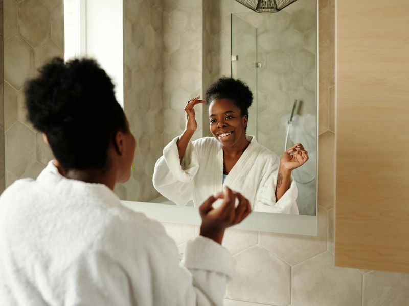 Person starting their morning routine with light movement.